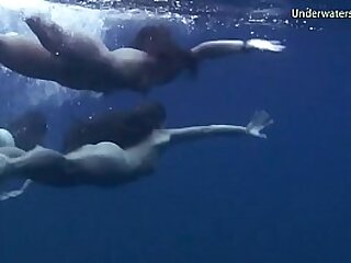 Girls on Tenerife swimming naked